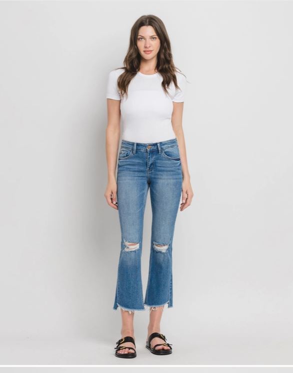 Mid Rise Raw Step Hem Kick Flare Jeans